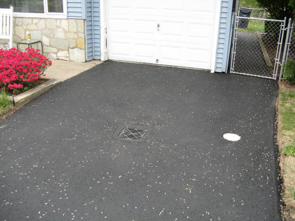 Finished driveway, drain & service pipe