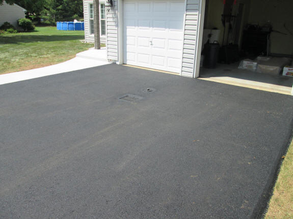Finished driveway at garage area